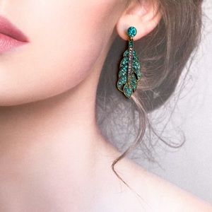 Heidi Daus Green Crystal Leaf Dangle Drop Earrings